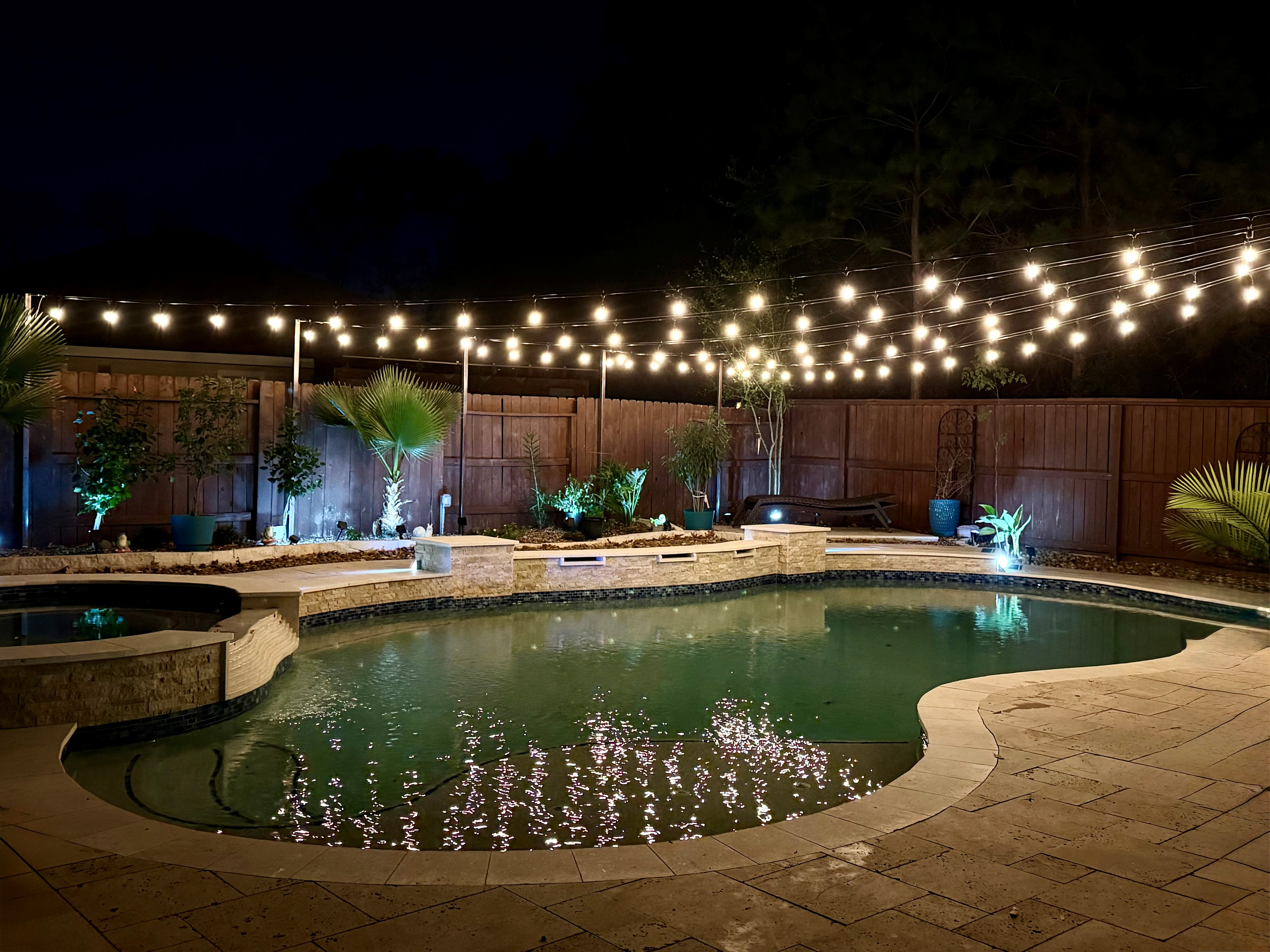 Warm patio string lights creating an inviting outdoor entertaining atmosphere